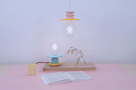 Frutti is a series of colorful pendant and stand lamps with bright stone bases