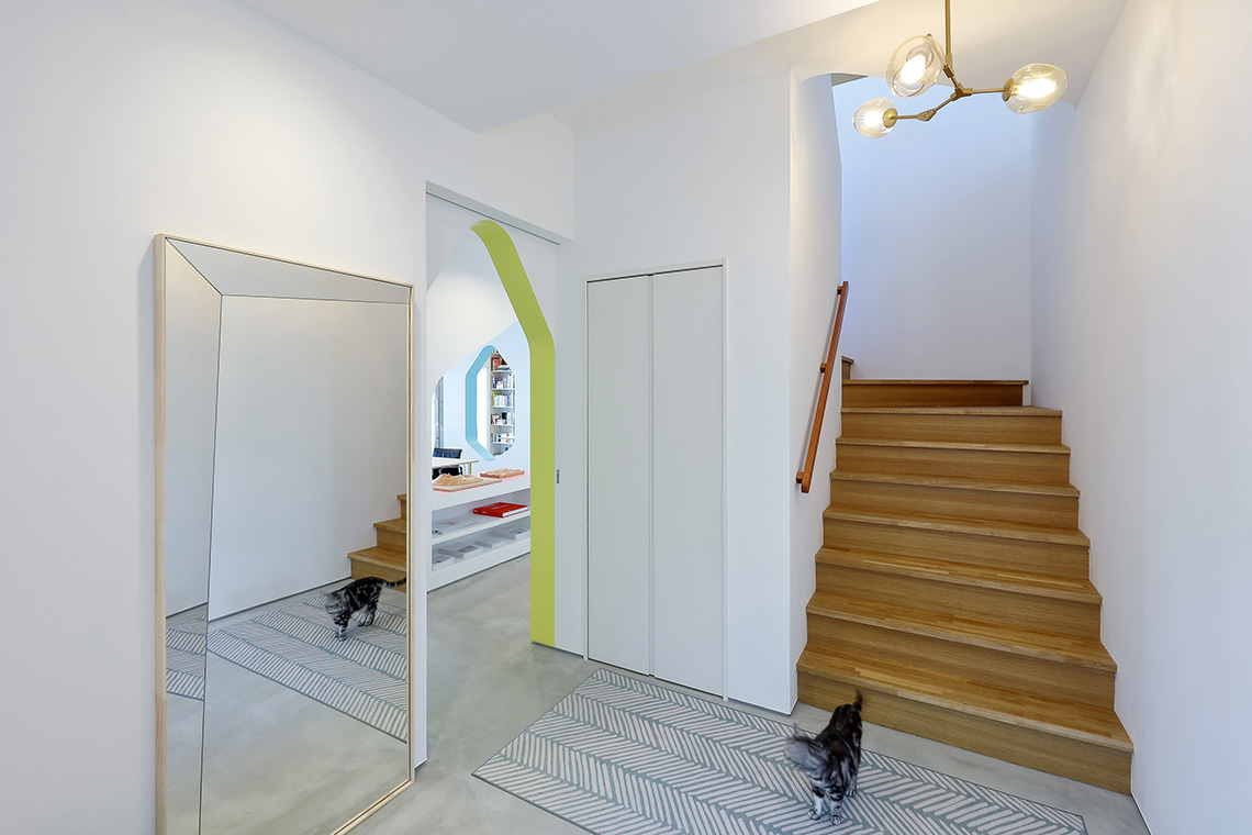 24d-studio residential foyer with wide oak stairway
