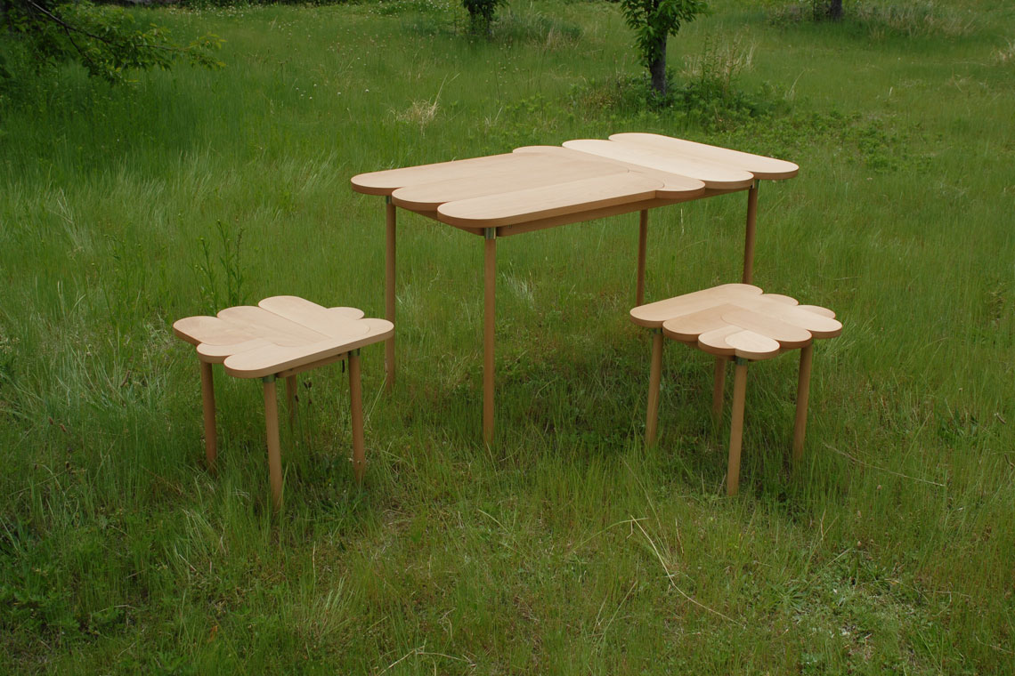 Moku plus is a collection of wood tables and seating inspired by children’s puzzle.
