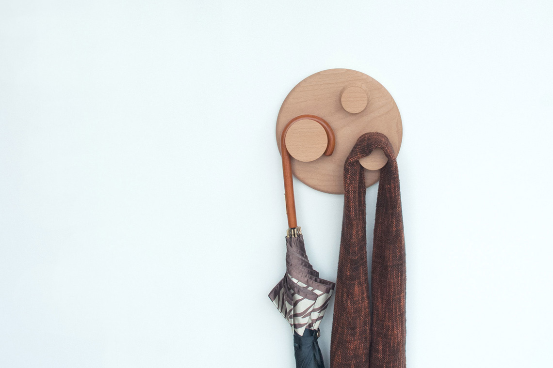 Orbit large hanger consists of three hooks attached to solid beech wood round plate.