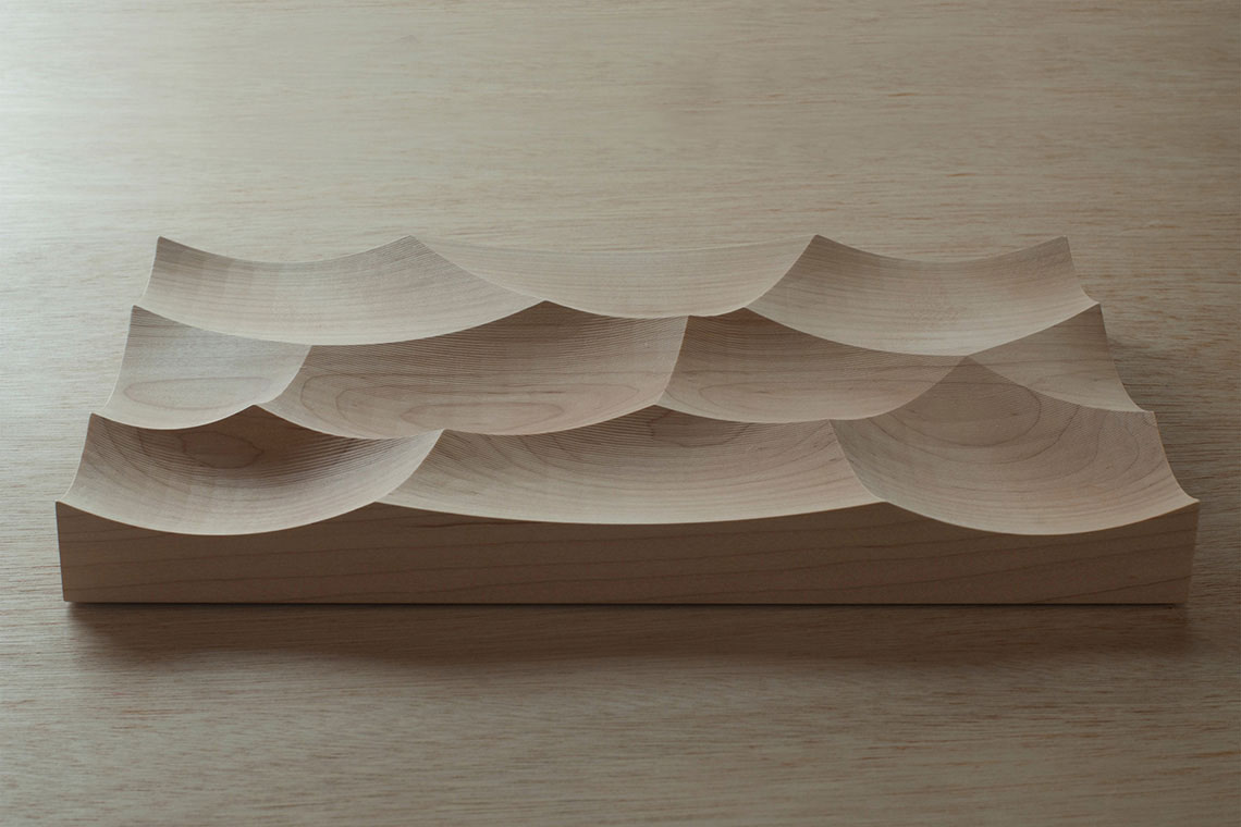 Storm is a sculptural tray inspired by the waves of the ocean and made from hardwood Maple.
