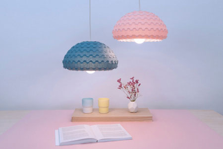 Kasa is a series of bright sculptural pendant lamps with luminous organic form 