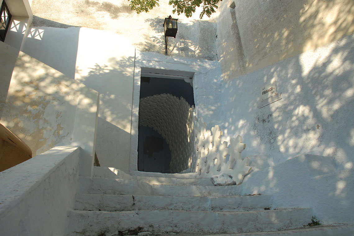 Photo showing Daphne installation starting from a few panels at the foot of the stairs and gradually growing in number as it enters the tunnel space.